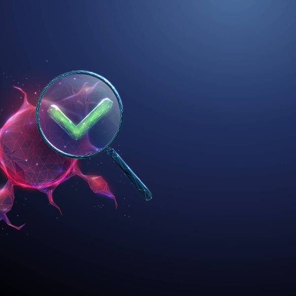 3d tumor under magnifying glass with green check mark