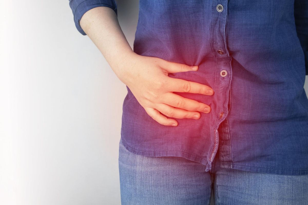 A woman suffers from pain in the appendix