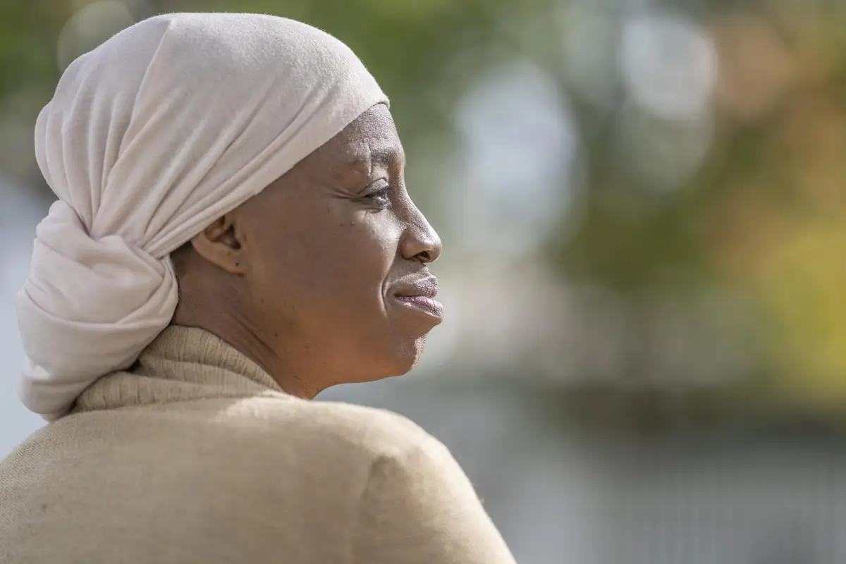 African American woman with cancer enjoying time outside
