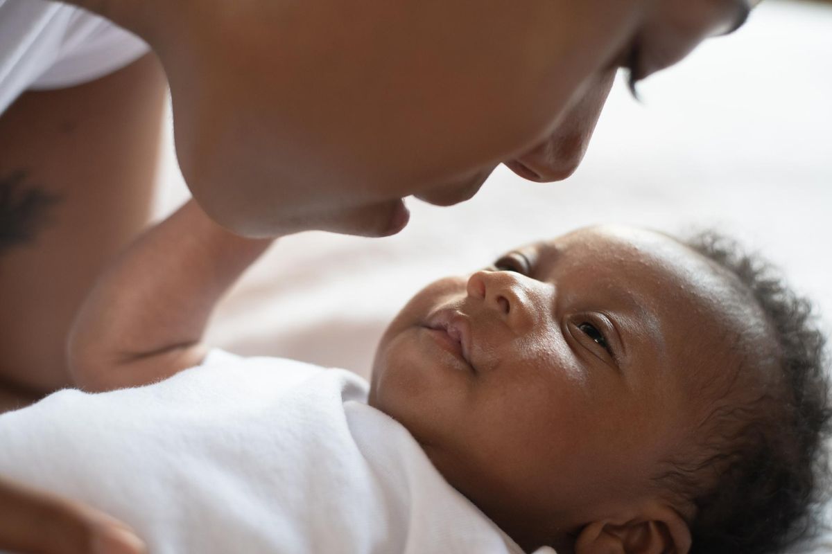 African Infant And Mother Intimate Moment