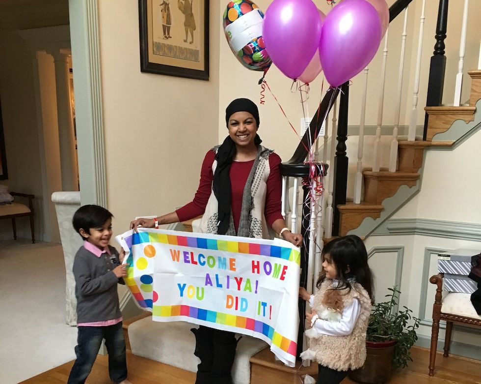 Aliya's children welcoming her home