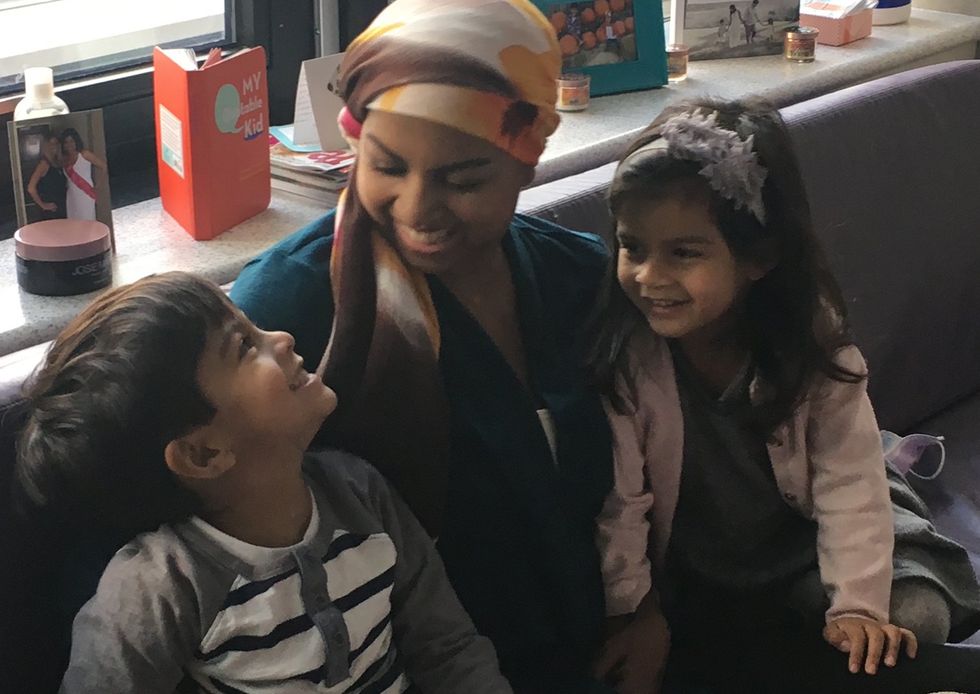 Aliya with her two children, 2015