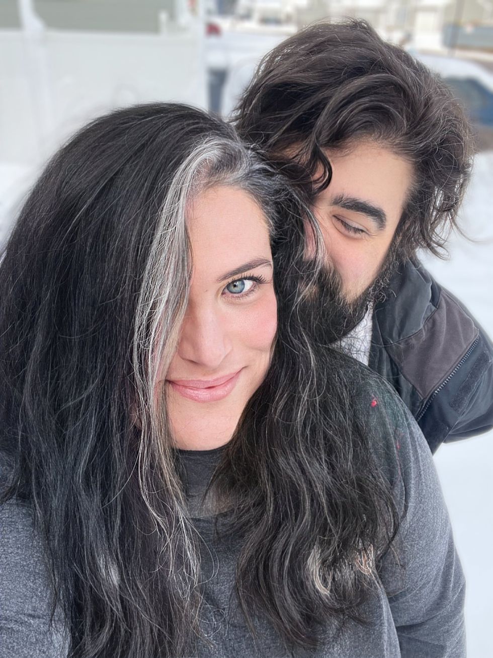 Alyson and her husband in snowy Michigan, 2023.