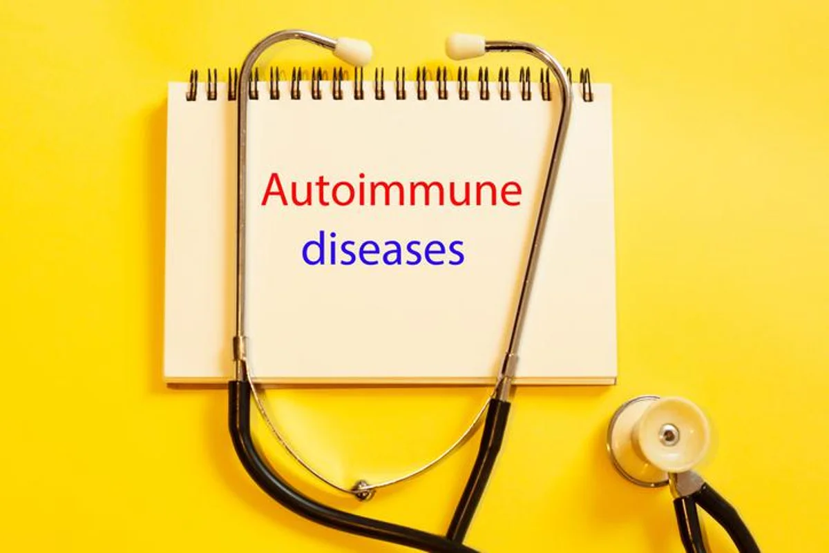 Autoimmune diseases-- concept of medical diagnosis in doctor's notes on yellow background