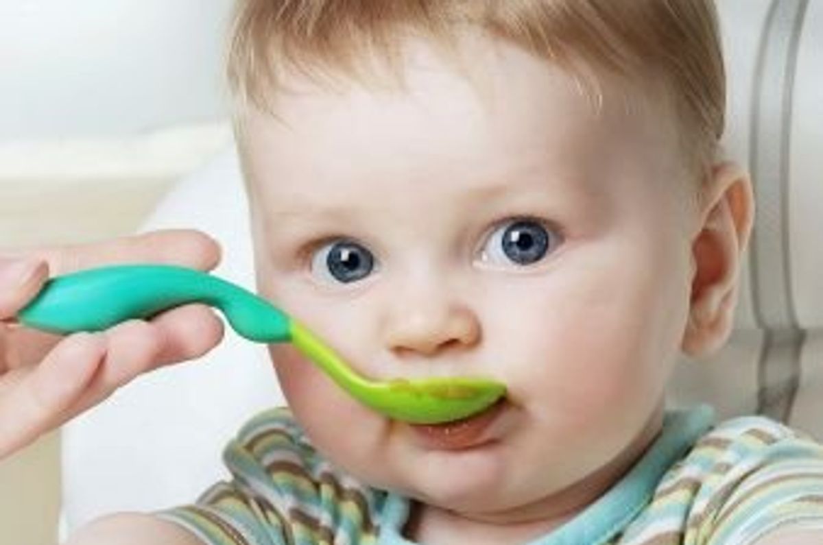 baby eating baby food