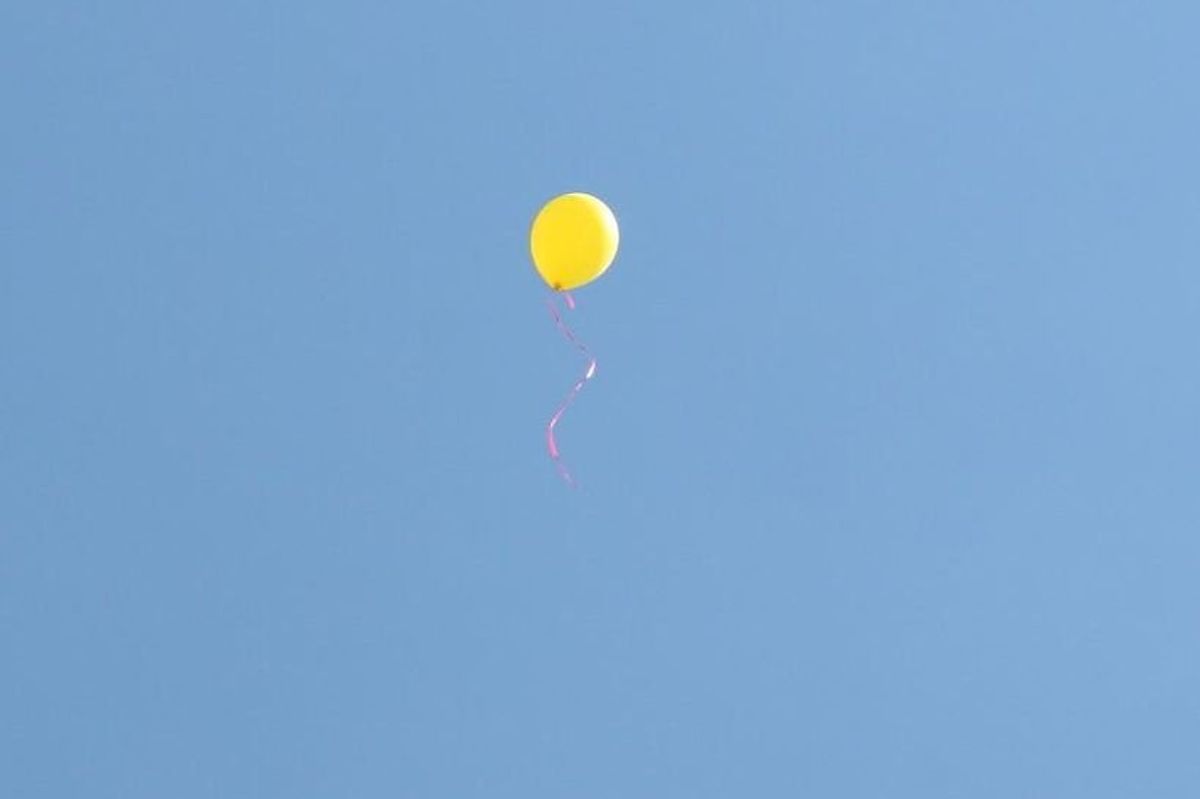 balloon floating away