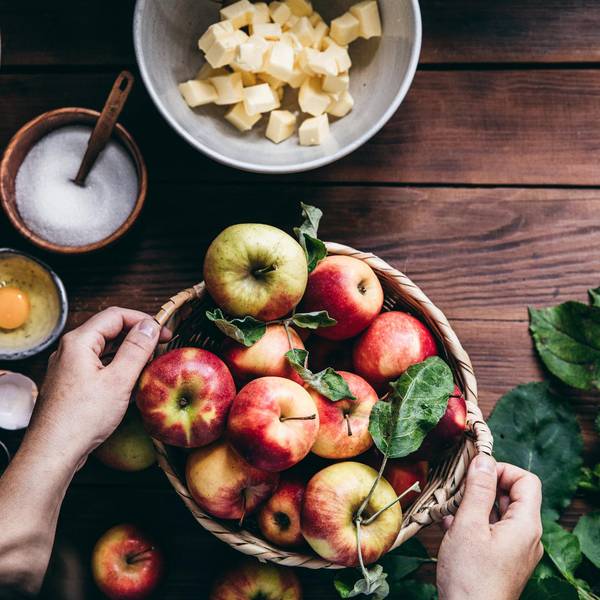 basket of apples and other food