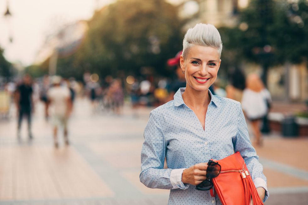 beautiful elegant middle aged woman outdoors