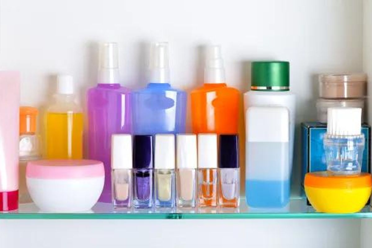 beauty products on a bathroom shelf