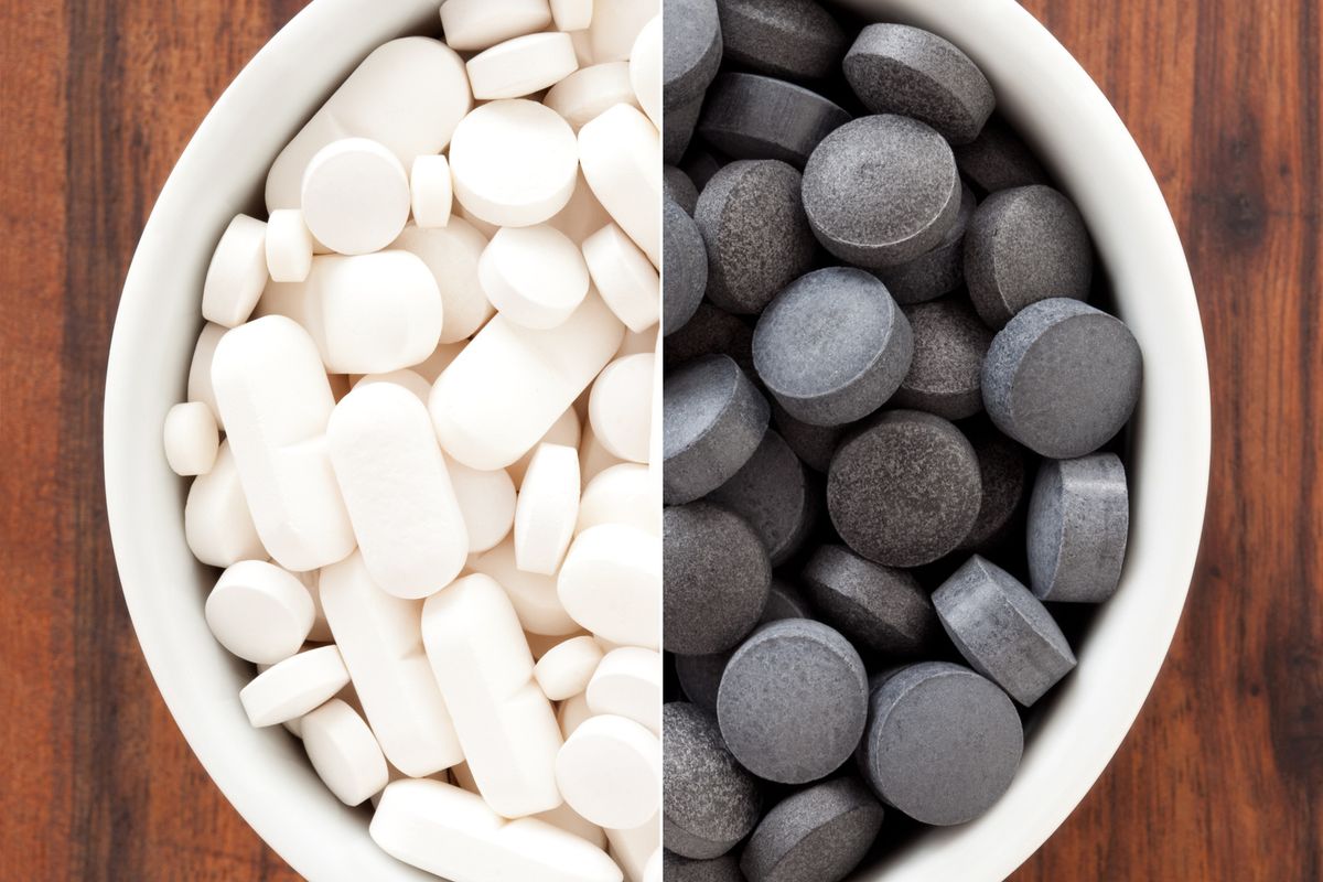 Black and white pills composition