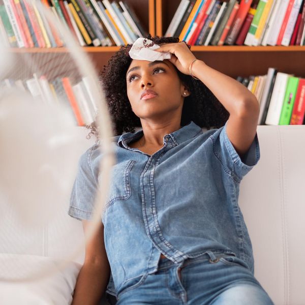 Black girl feeling bad for summer heat