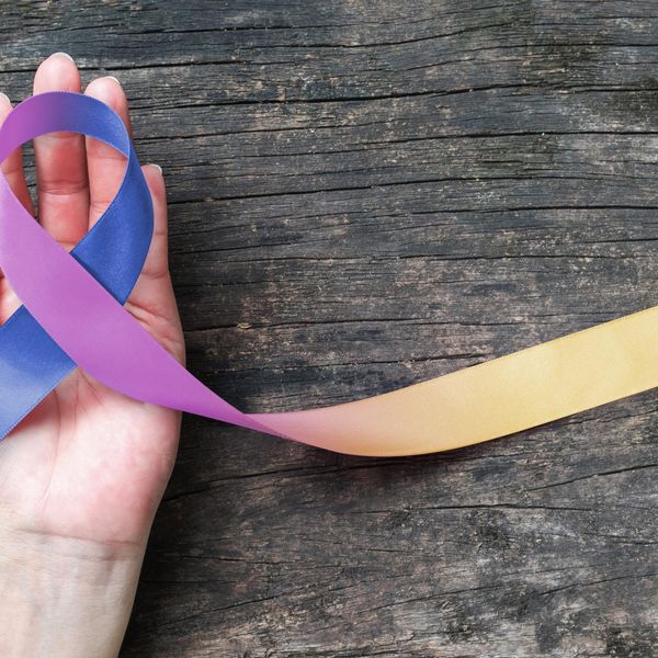 Bladder cancer awareness marigold blue purple ribbon