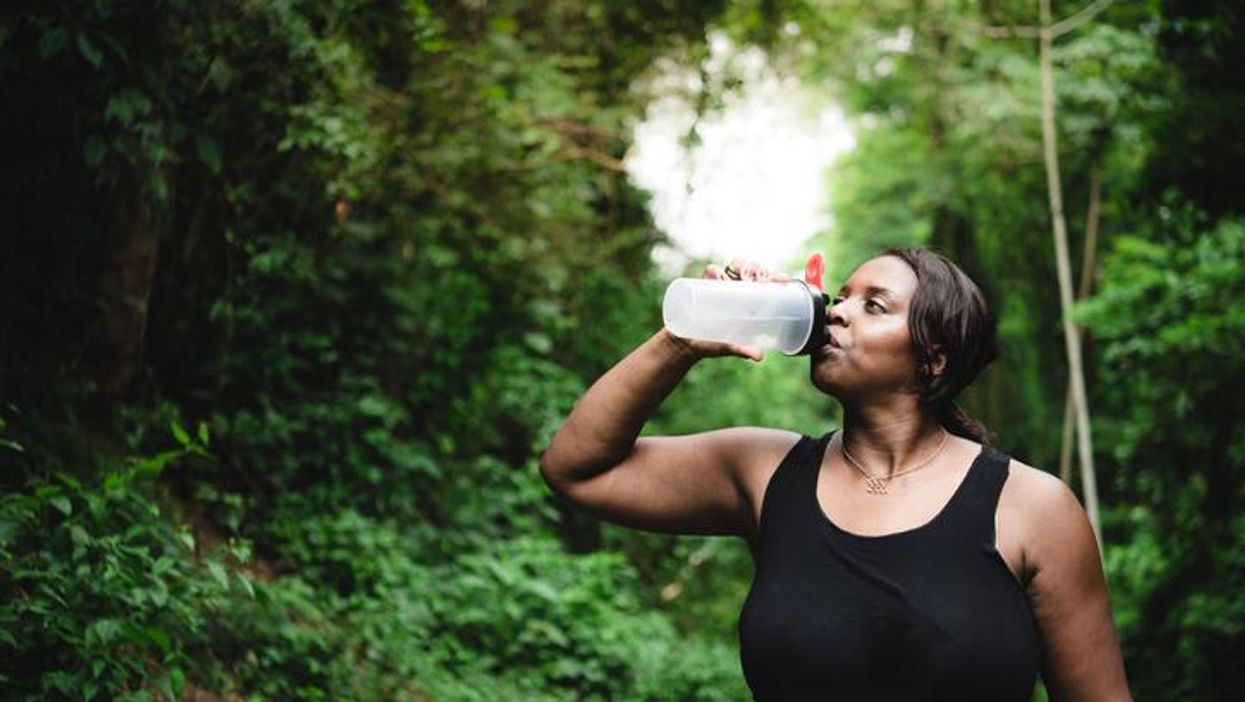Body positive woman hydrating