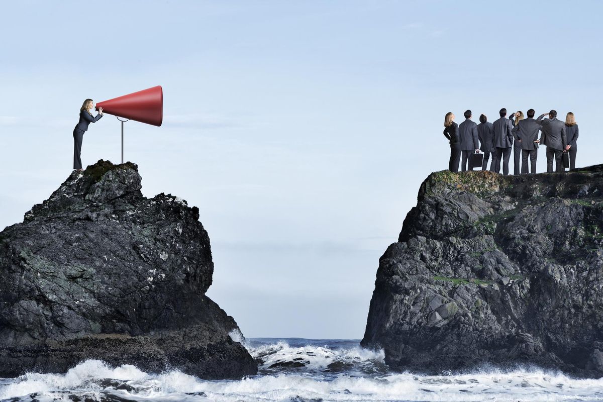 Businesswoman Shouts Through Very Large Megaphone