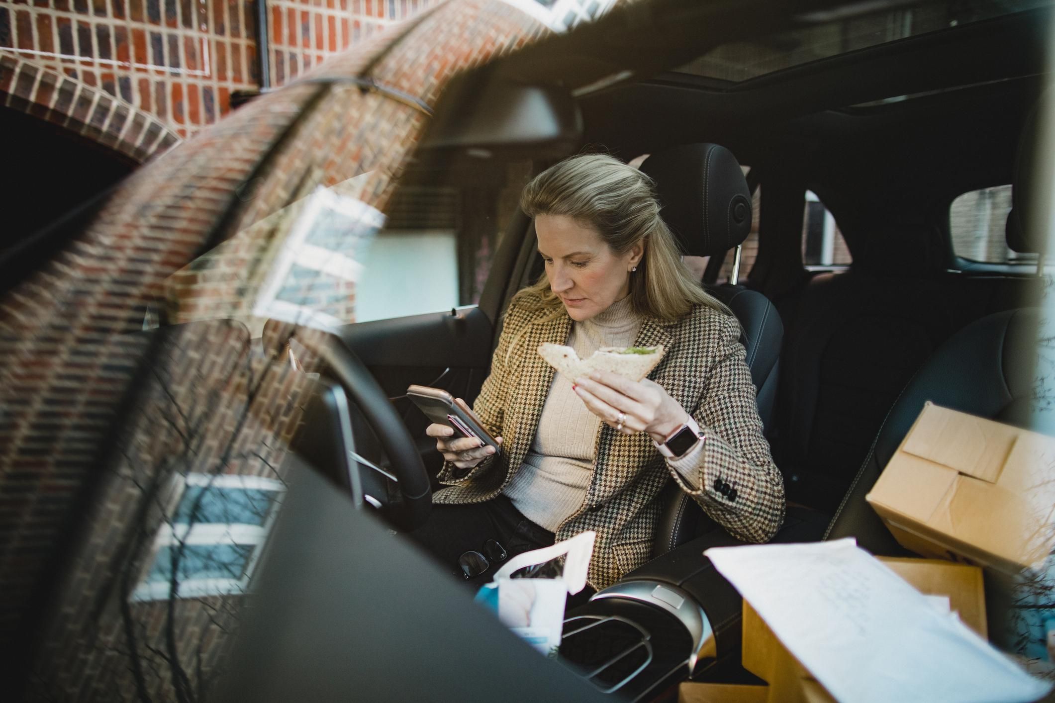 Businesswoman Working Through Lunch