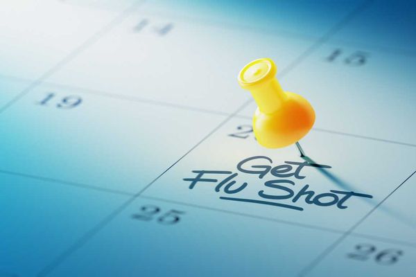Calendar Concept with a yellow pin