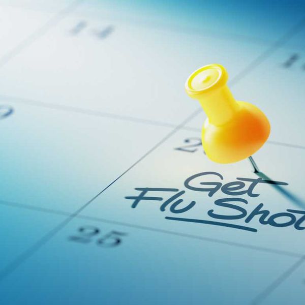 Calendar Concept with a yellow pin