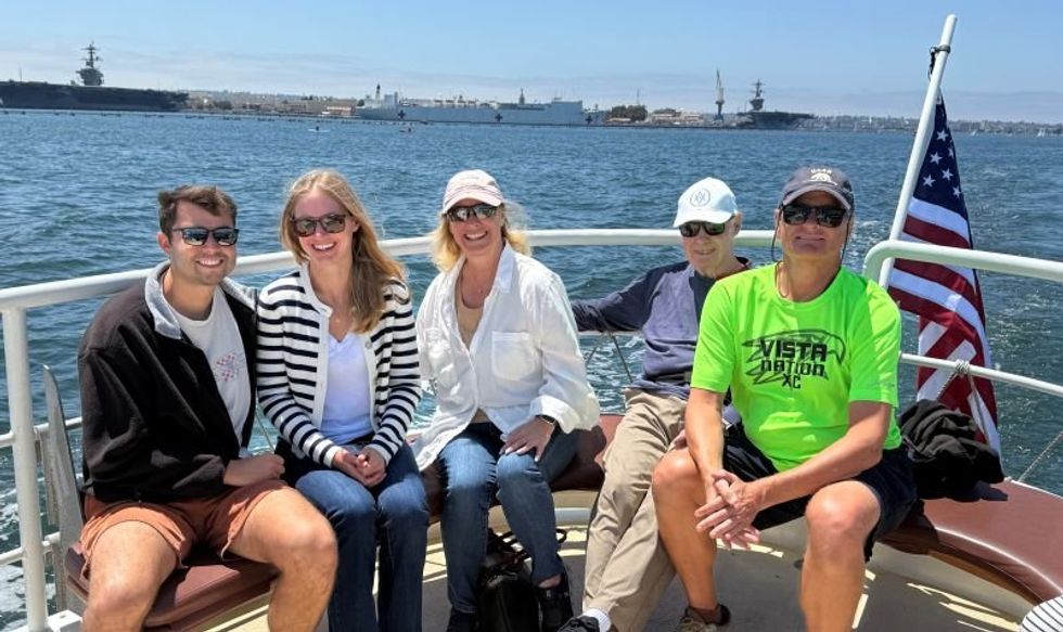 Carol and her family on a boat