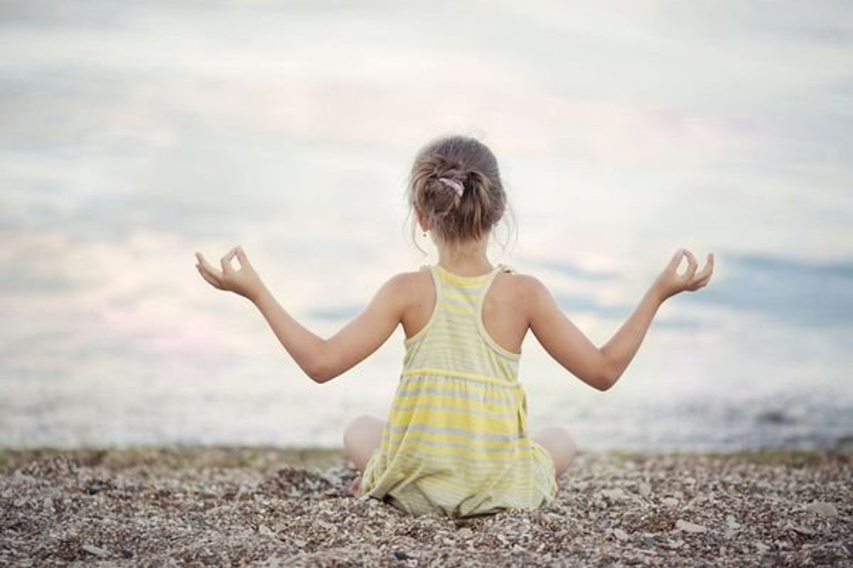 child meditating