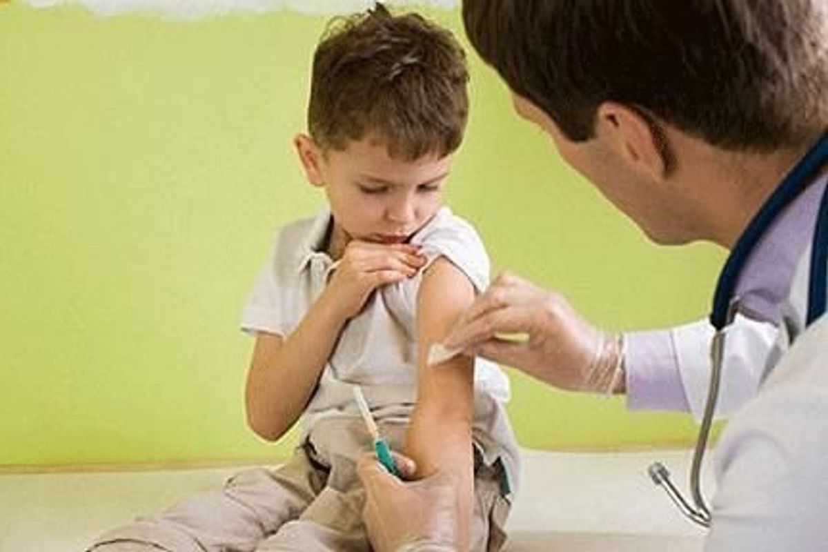 child receiving a vaccination