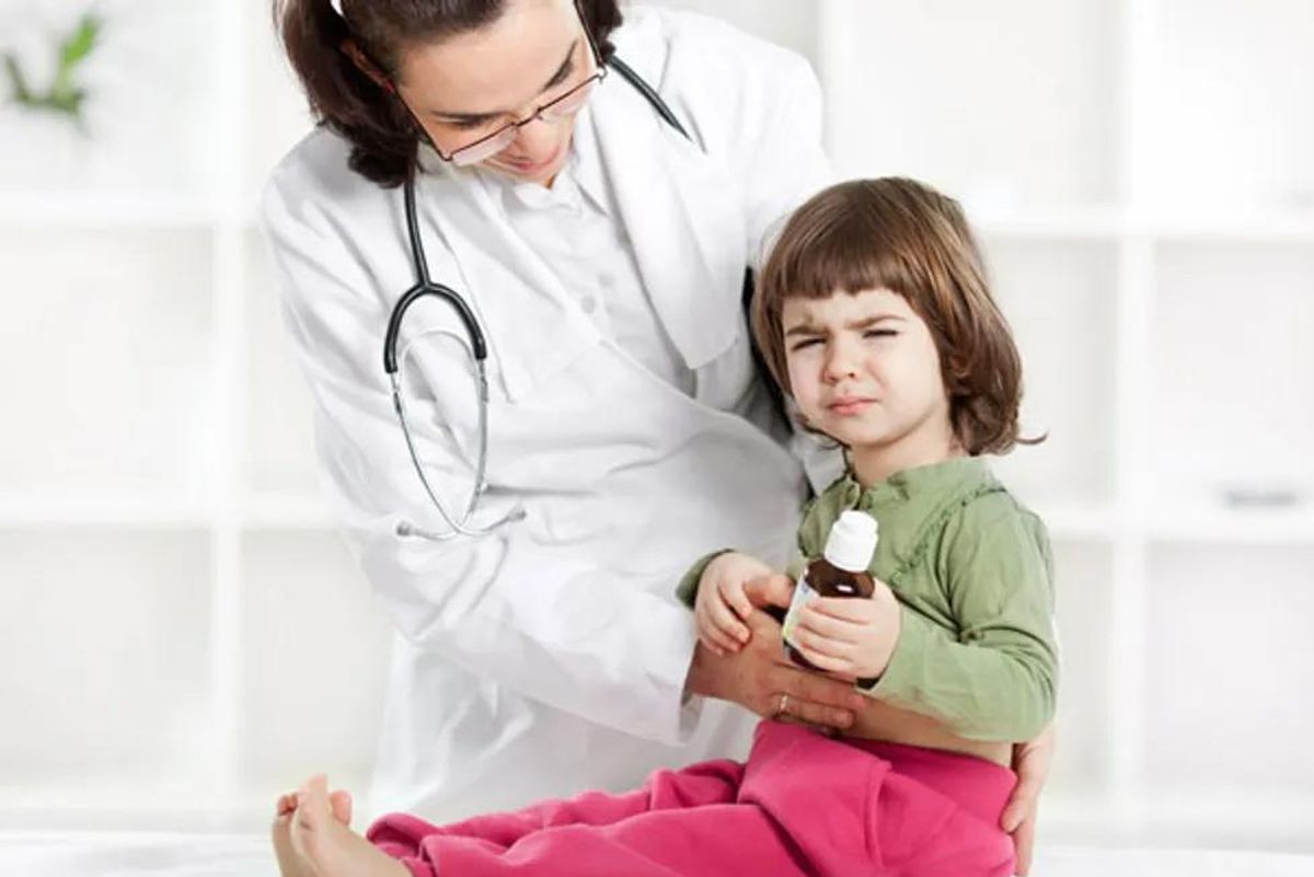 child with upset stomach