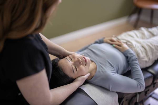 chiropractor provides a relaxing adjustment session
