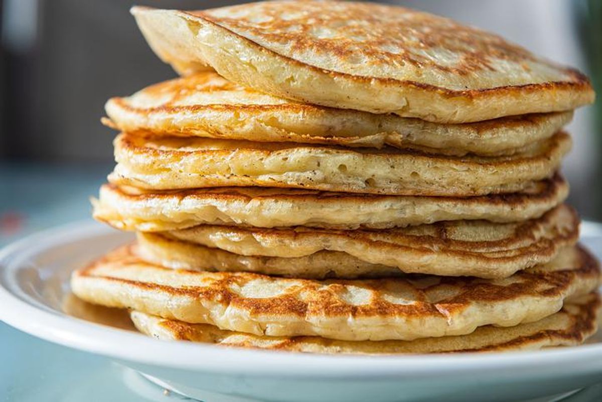 closeup side view of stack of buttermilk pancakes