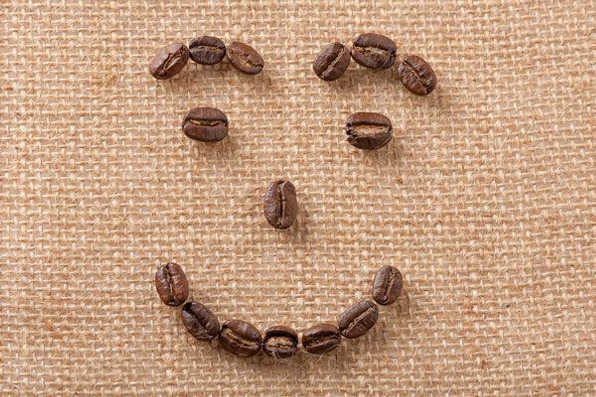 coffee beans in the shape of a smiley face