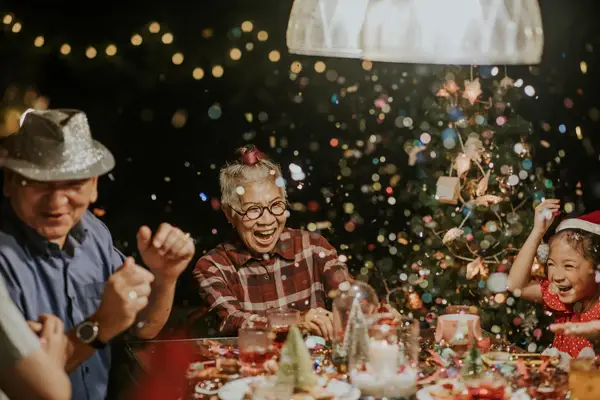 Confetti cannons are shoot in Christmas celebration