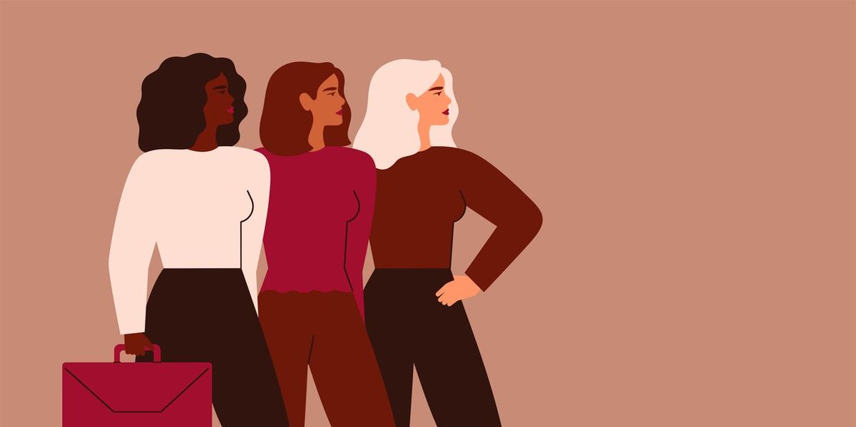 Confident businesswomen stand together.
