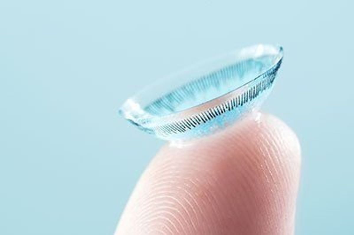 contact lens on a finger