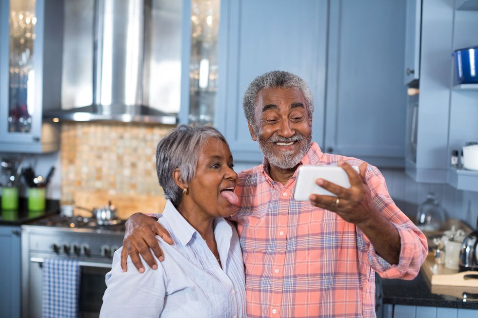 couple being silly while taking a photo