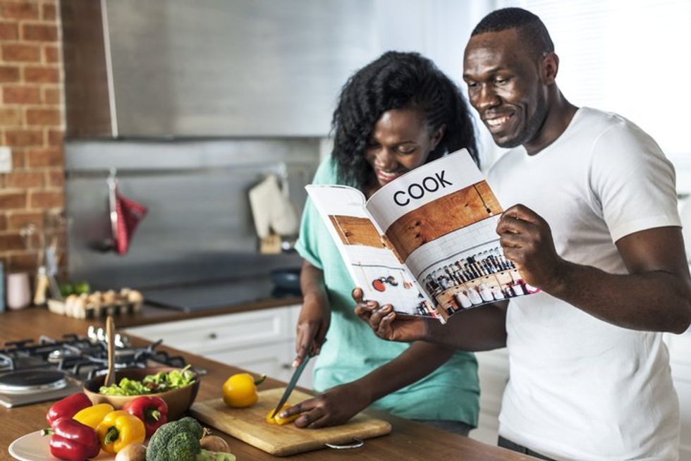 Couple cooking in the kitchen together