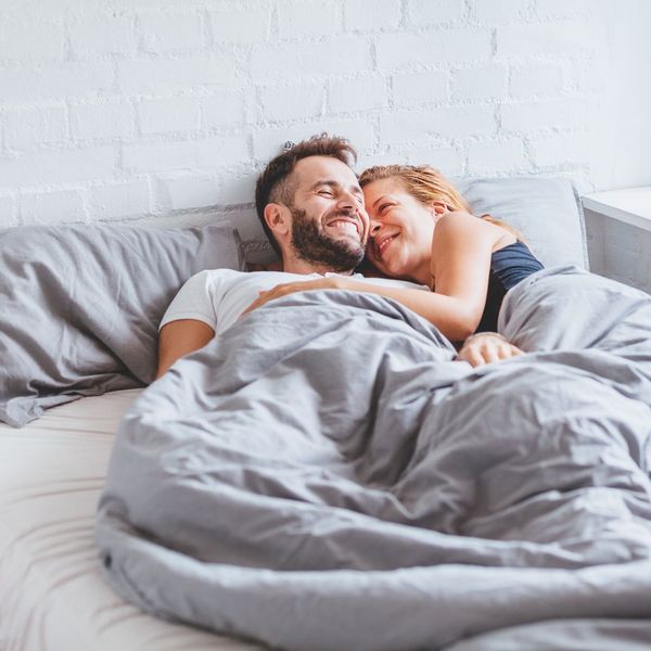 couple enjoying bedtime in the morning