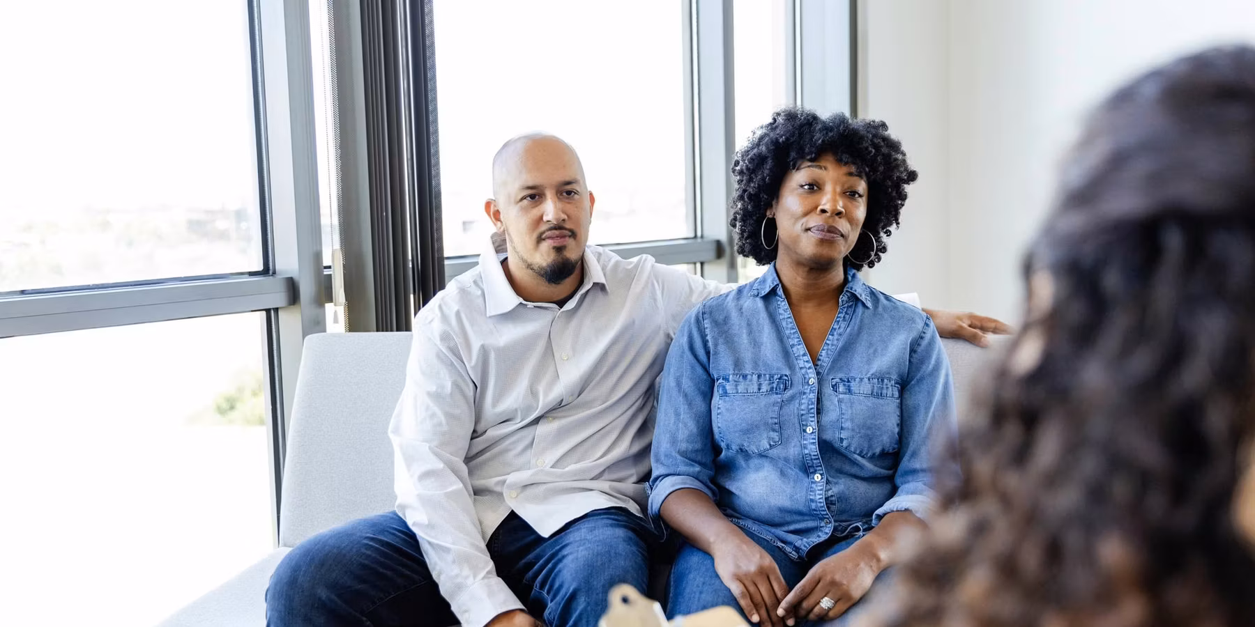 couple listening to marriage counselor