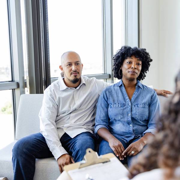 couple listening to marriage counselor