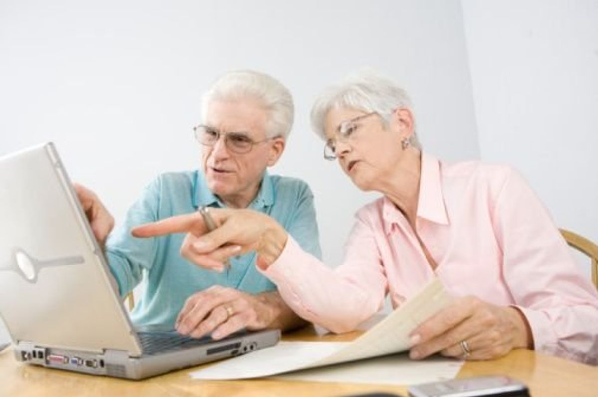couple looking at a laptop