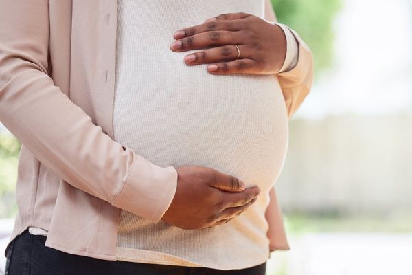 Cropped shot of a pregnant woman mother