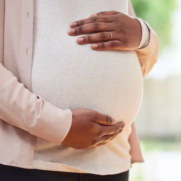 Cropped shot of a pregnant woman mother