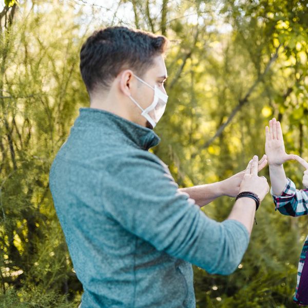 Deaf and hard hearing Young Adults wearing special face mask for lip-reading
