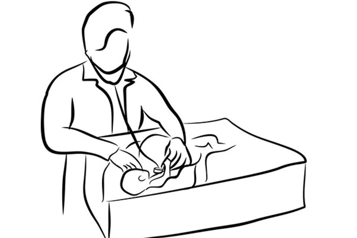 doctor checking newborn