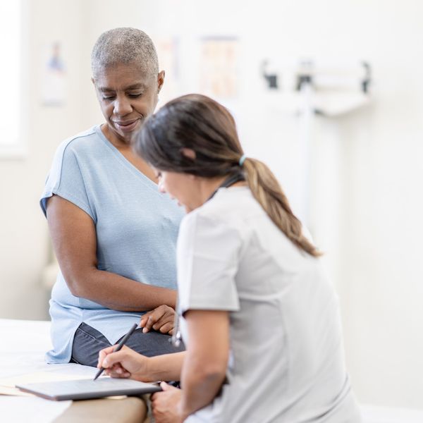 Doctor Giving a Cancer Patient Test Results