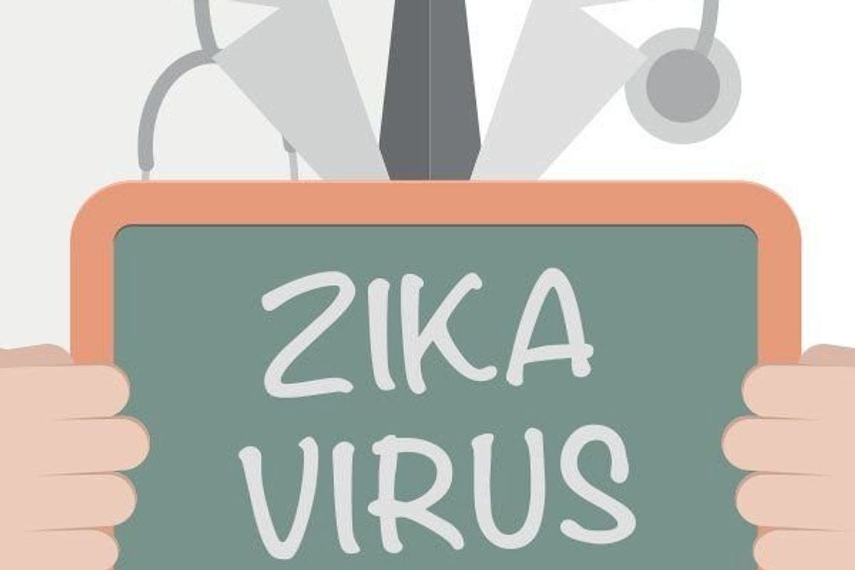 doctor holding a zika virus sign