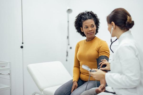 Doctor measuring blood pressure