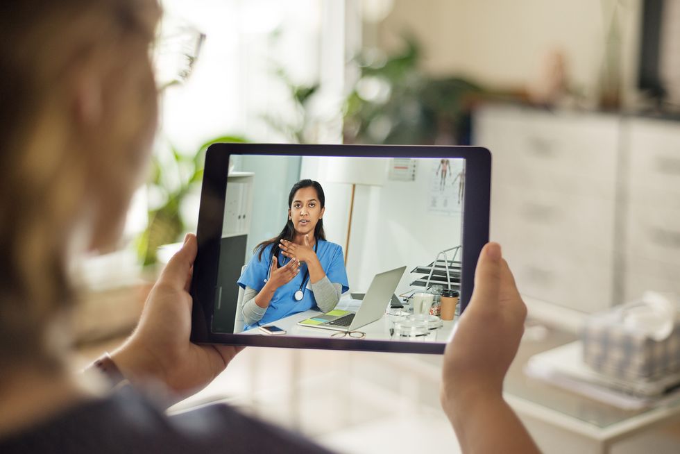 doctor on ipad - telehealth visit