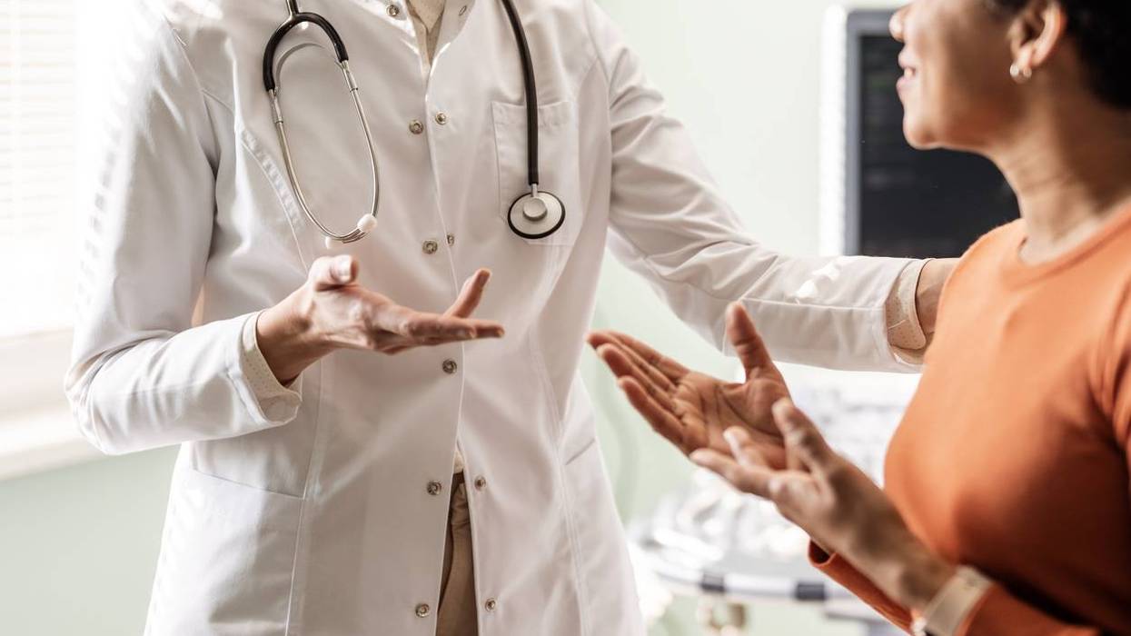 Doctor Sharing lupus Test Results