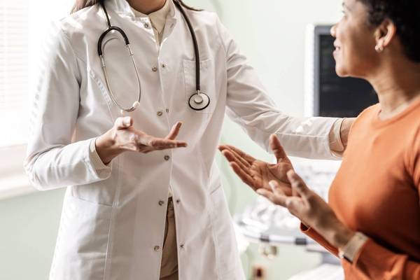 Doctor Sharing lupus Test Results