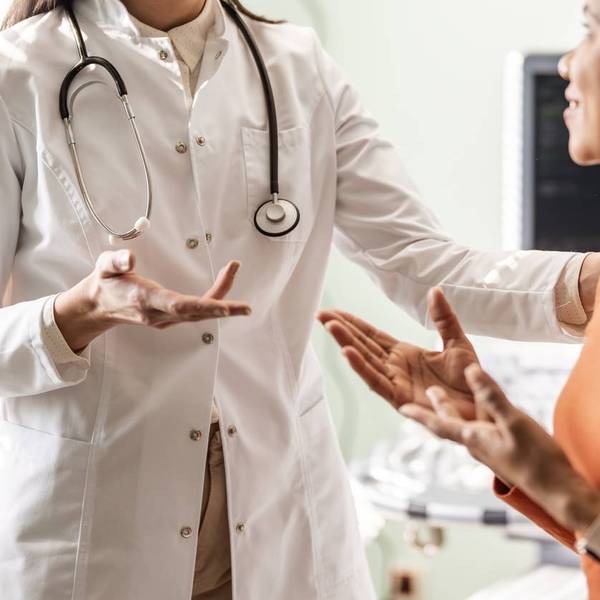 Doctor Sharing lupus Test Results