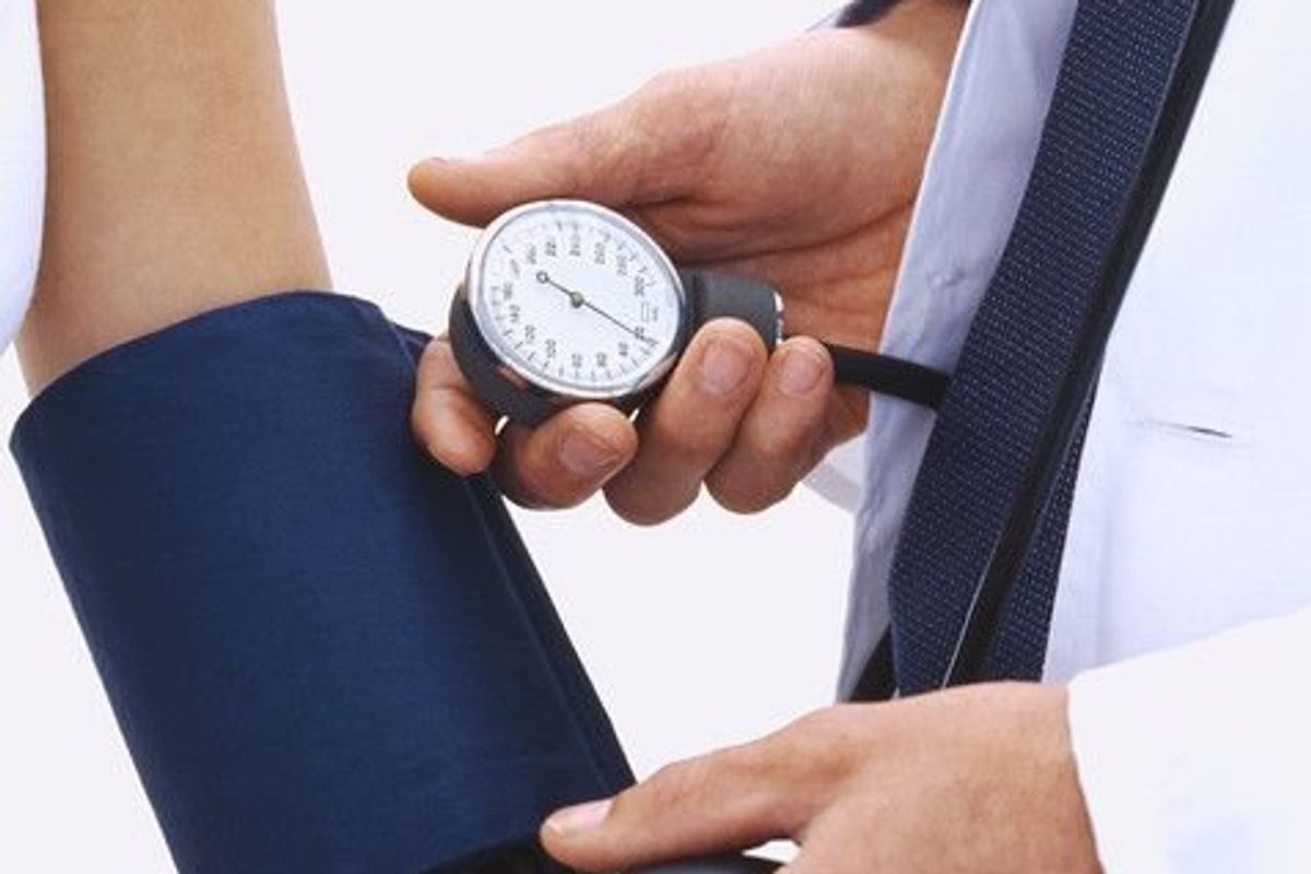 doctor taking a blood pressure