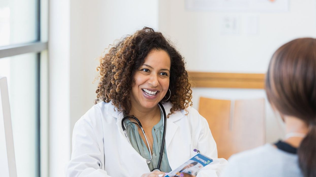 Doctor talks with patient about healthcare options